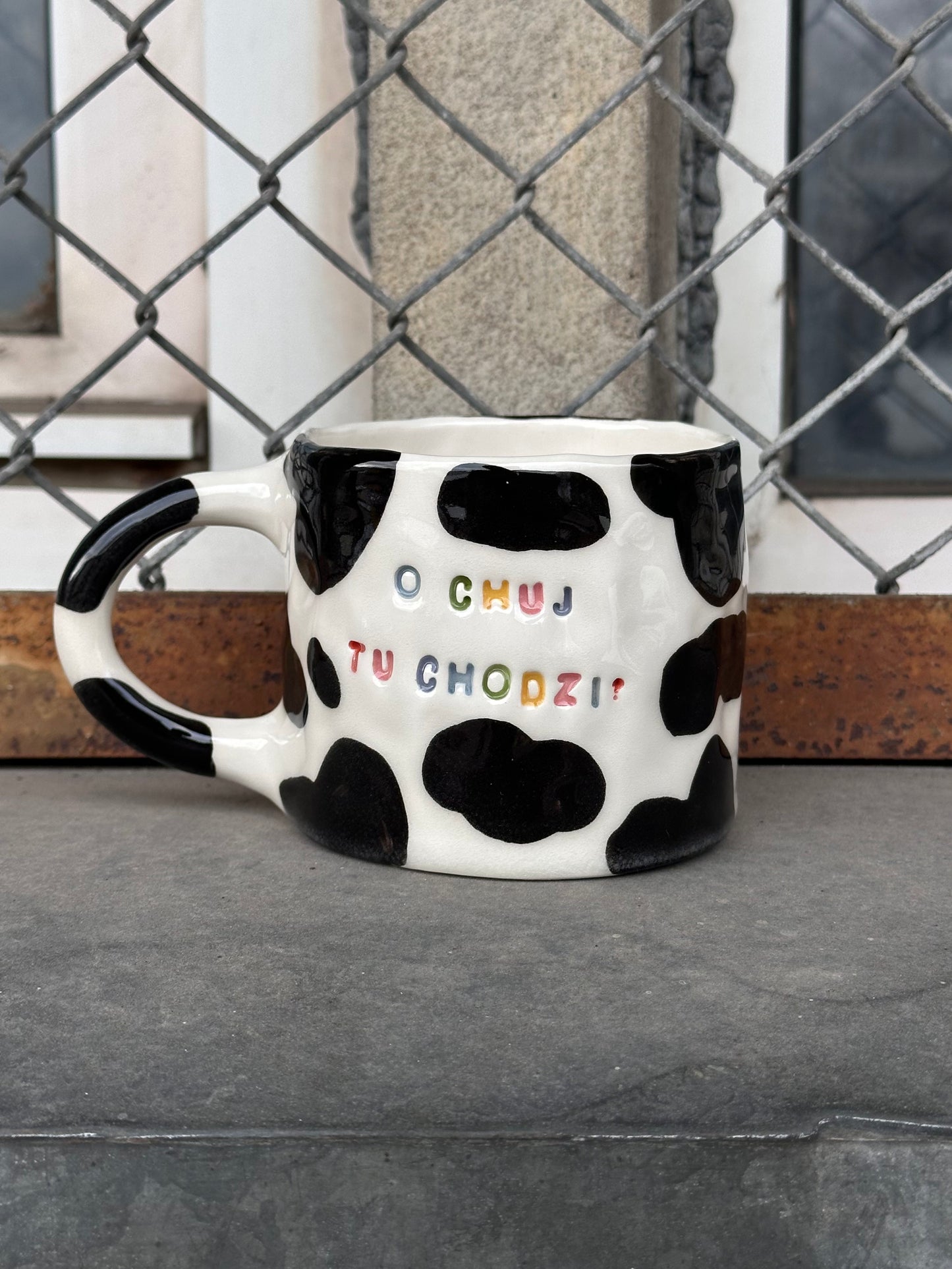 Kubek L "o chuj tu chodzi?"