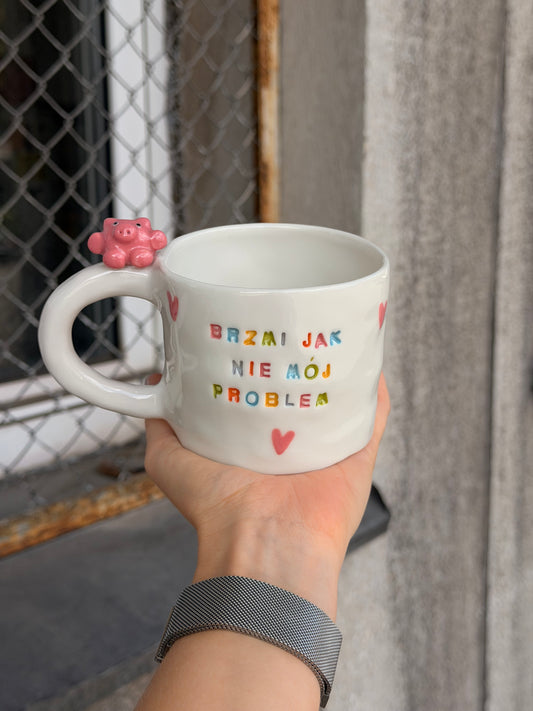Kubek L "brzmi jak nie mój problem"