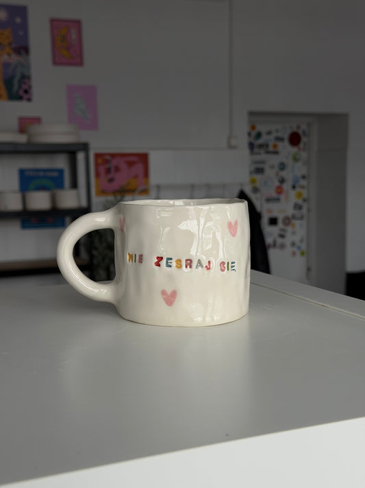 Kubek L "nie zesraj się"