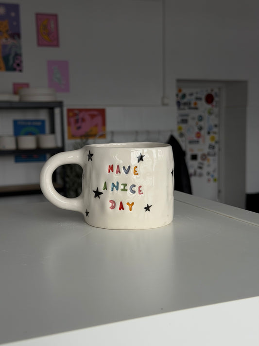 Kubek L "have a nice day"