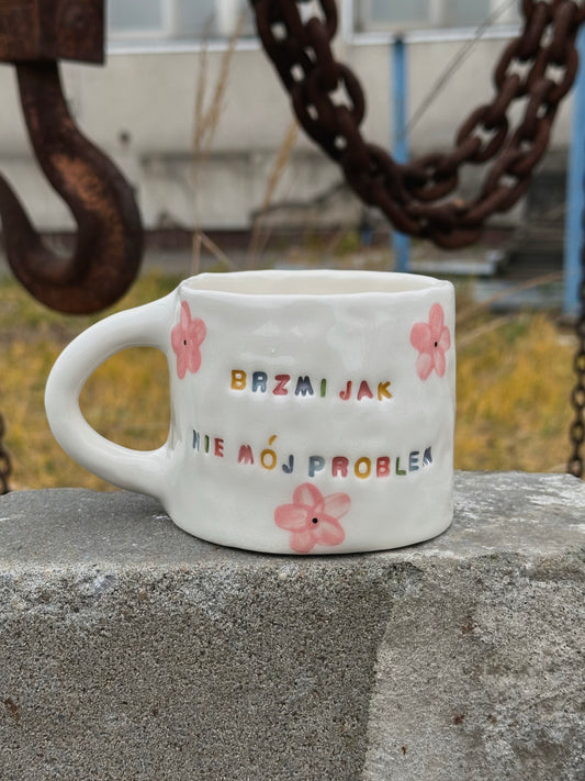 Kubek L "brzmi jak nie mój problem"