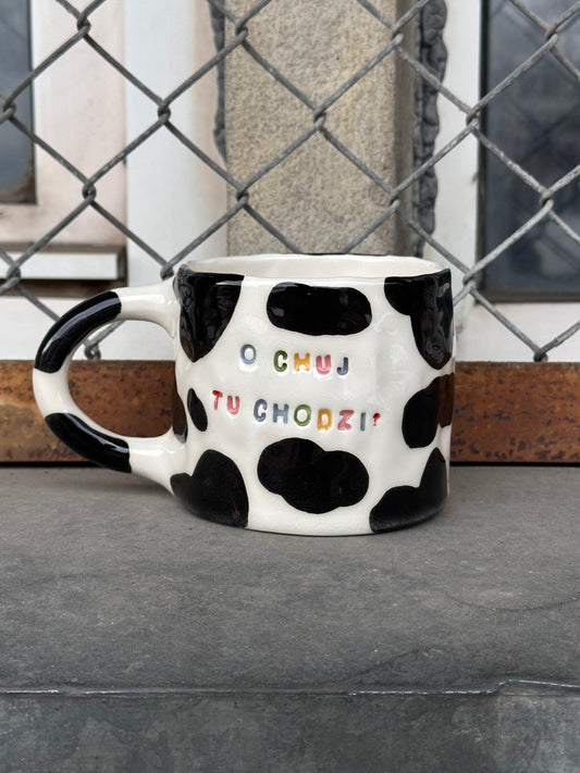 Kubek L "o chuj tu chodzi?"